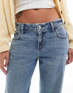 Hollister Low Rise Relaxed Straight Fit Jeans With Knee Rips In Mid Blue For Women Mid Wash -Hollister Shop 206971998 4